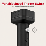 A close-up of a black handheld trigger switch with a silver power button, shown against a light beige background with red and black text reading 'Variable Speed Trigger Switch for greater flexibility and control'.